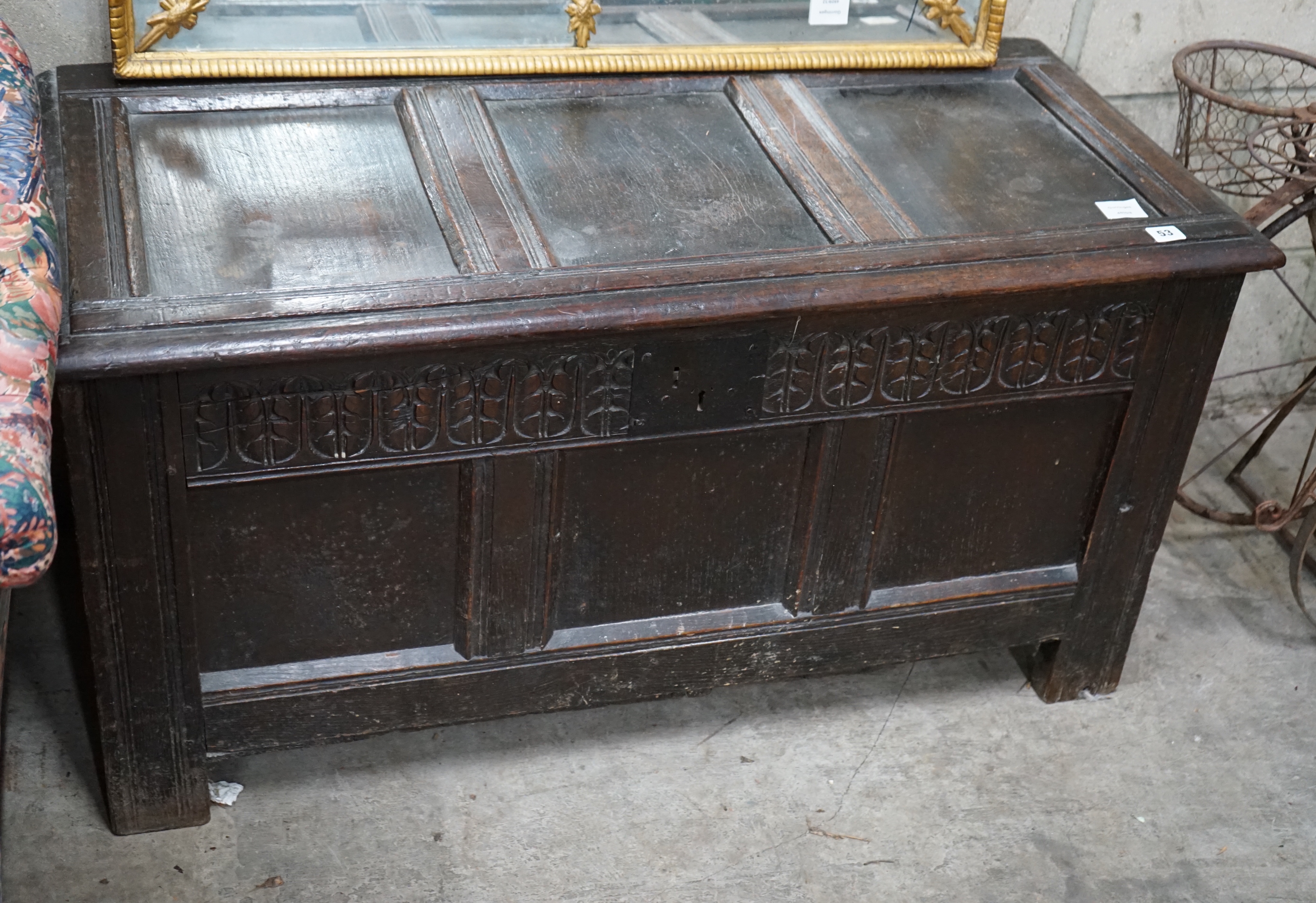 An 18th century oak coffer (re-lined), width 108cm depth 49cm height 56cm